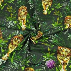 Tygrysy z liśćmi palmowymi na ciemno zielonym tle