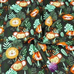Cotton animals in the jungle on a dark green background