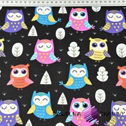 Cotton colorful owls with trees on a black background