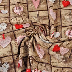 Cotton red hearts on beige board