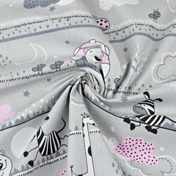 Cotton Teddy bears and pink giraffes in stripes on a gray background