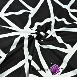 Cotton white cobweb on a black background