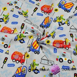 Cotton animals on colored vehicles on a gray background