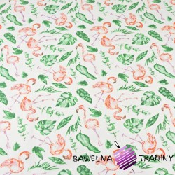 Cotton flamingos in tropical leaves on white background