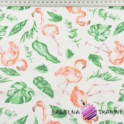 Cotton flamingos in tropical leaves on white background