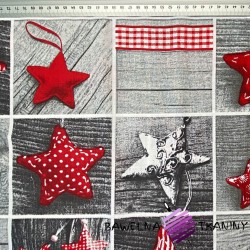 Patchwork Christmas pattern with red stars on gray board