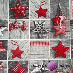 Patchwork Christmas pattern with red stars on gray board