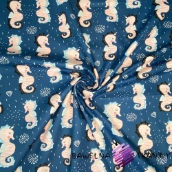 Cotton seahorses on a light navy blue background