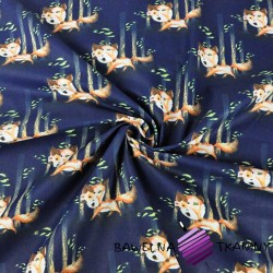 Cotton foxes in trees on a navy background