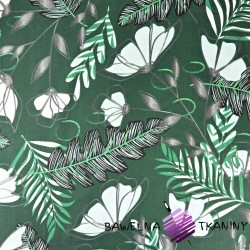 Cotton fern leaves with flowers on a dark green background