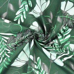 Cotton fern leaves with flowers on a dark green background