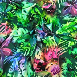 Cotton Jersey knit digital printing of colourful jungle on a dark green background