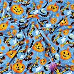Cotton Jersey knit digital printing of halloween pumpkins on a blue background