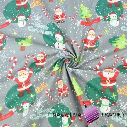 Cotton Christmas pattern Santas with snowmen on a gray background