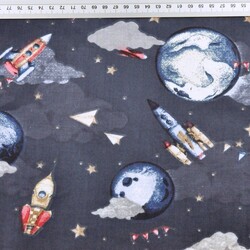 Cotton Planets with rockets in the gray-navy blue sky