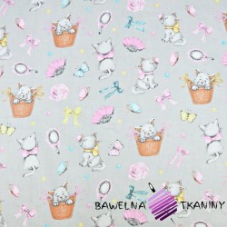 Cotton cats with a pink bow on a gray background