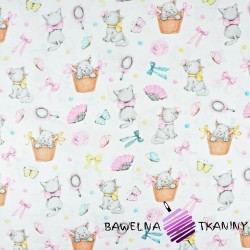 Cotton cats with a pink bow on a white background