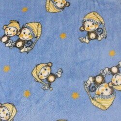 Soft fleece monkeys on a blue background