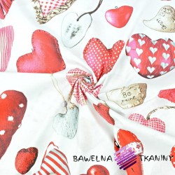 Cotton red pendants hearts on white background
