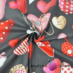 Cotton red pendants hearts on dark gray background