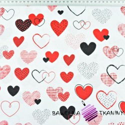 Cotton red hearts on white background