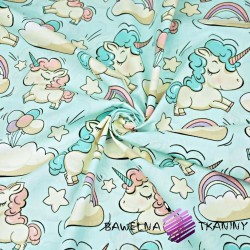 Cotton unicorns with balloons on mint background