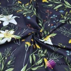 Cotton flowers twigs with lilies on a navy blue background