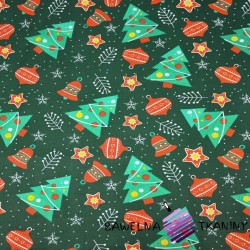 Cotton Christmas tree with baubles on dark green background