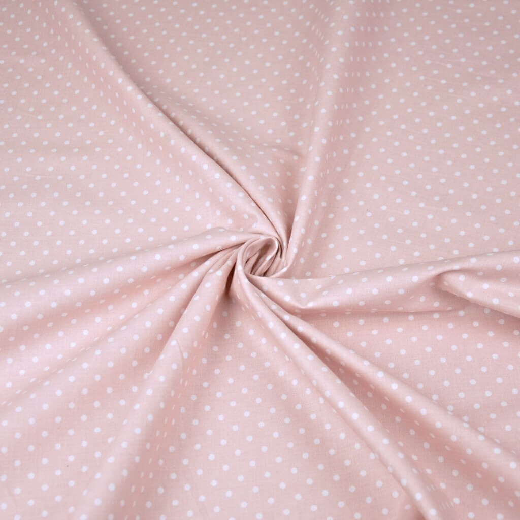 Cotton 4mm white dots on a dirty pink background