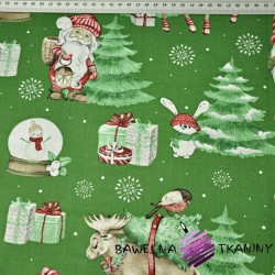 Cotton Christmas pattern santa clauses with the moon on green