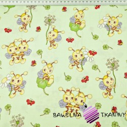 Cotton bees with little flowers on a pistachio background