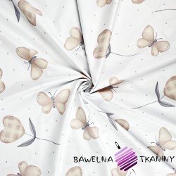 Cotton hearts with beige butterflies on a white background