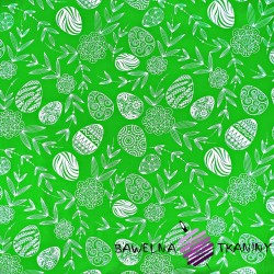Cotton easter pattern with easter eggs on a green background