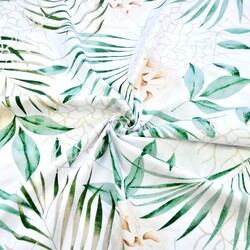 Cotton 100% green leaves with ecru flowers on a white background