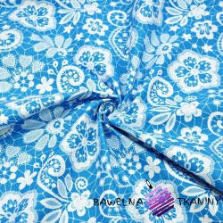 Cotton white guipure on turquoise background
