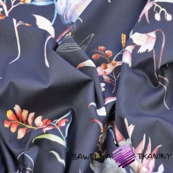Patterned cotton satin with pastel flowers on a graphite background