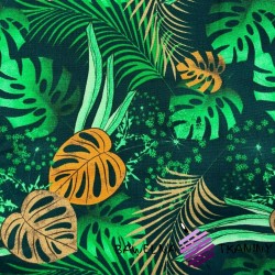Sun lounger fabric monstera leaves with orange on a black background