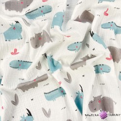Cotton double gauze muslin with rhinos and hippos