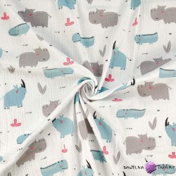 Cotton double gauze muslin with rhinos and hippos