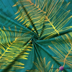 Cotton 100% golden palm leaves on a green background - 220 cm