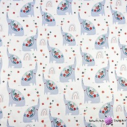 Cotton 100% blue elephants with flowers on a white background