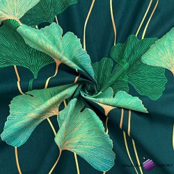 Cotton 100% ginkgo green leaves on a dark green background