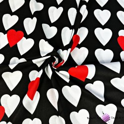 Cotton large red and white hearts on a black background