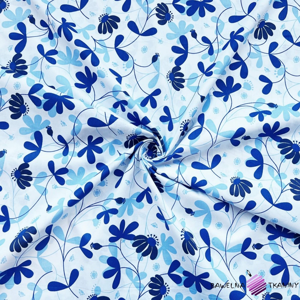 Cotton fabric with sapphire blue flowers on a white background