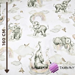 Cotton pastel elephants with a rainbow on a white background