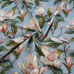 Cotton 100% beige magnolia flowers on a blue-gray background