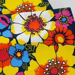 Sun lounger fabric with yellow-pink flowers on a navy blue background