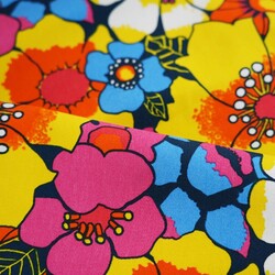 Sun lounger fabric with yellow-pink flowers on a navy blue background