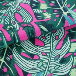 Sun lounger fabric with monstera leaves on a fuchsia background