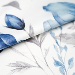 Patterned cotton satin with blue-beige flowers on a white background